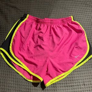 Size Small pink, black, and yellow Nike shorts